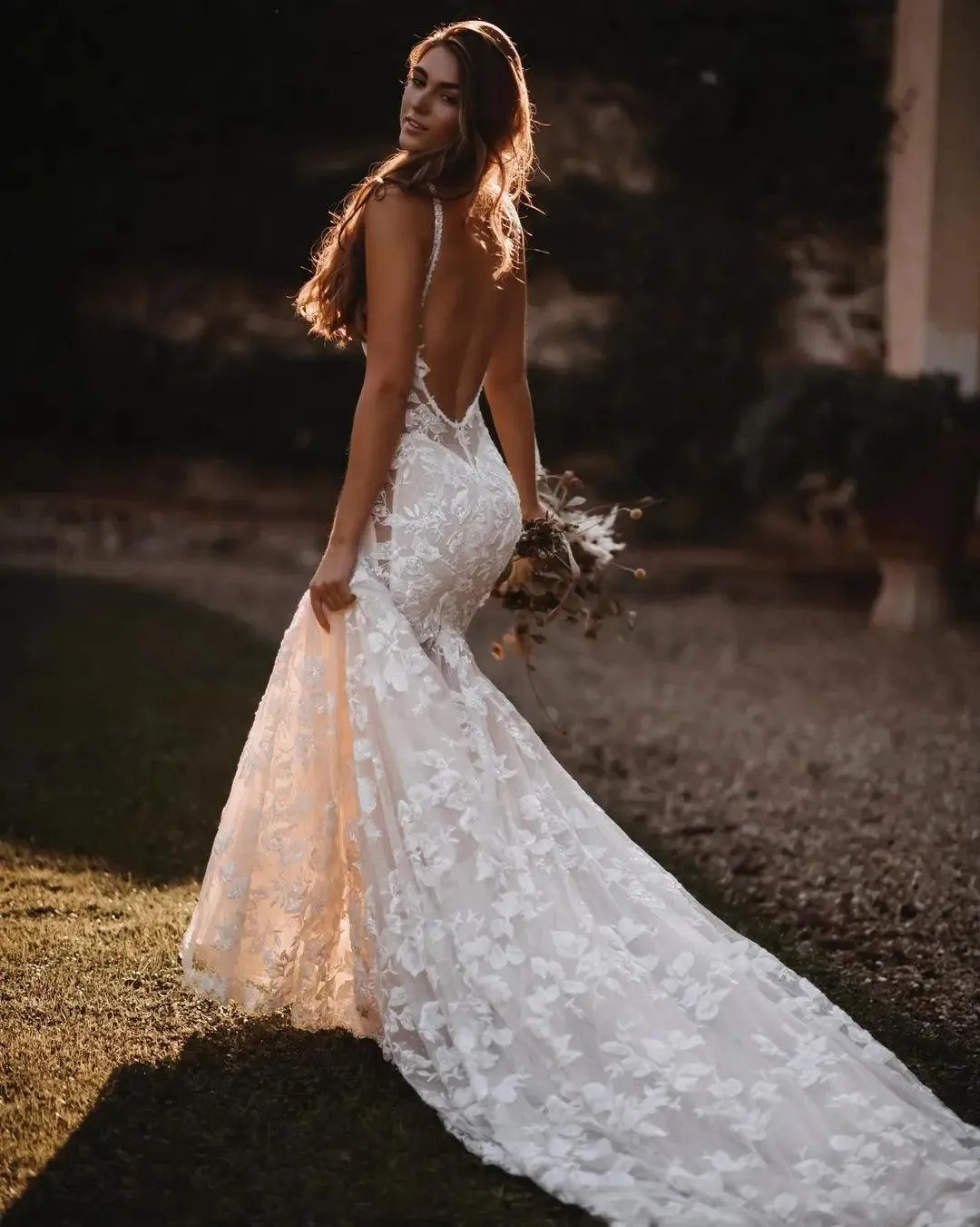 Ethereal Boho Beach Wedding Dress - Enchanting Lace Mermaid with Spaghetti Straps, Backless Floral Appliques, and Glittering Tulle